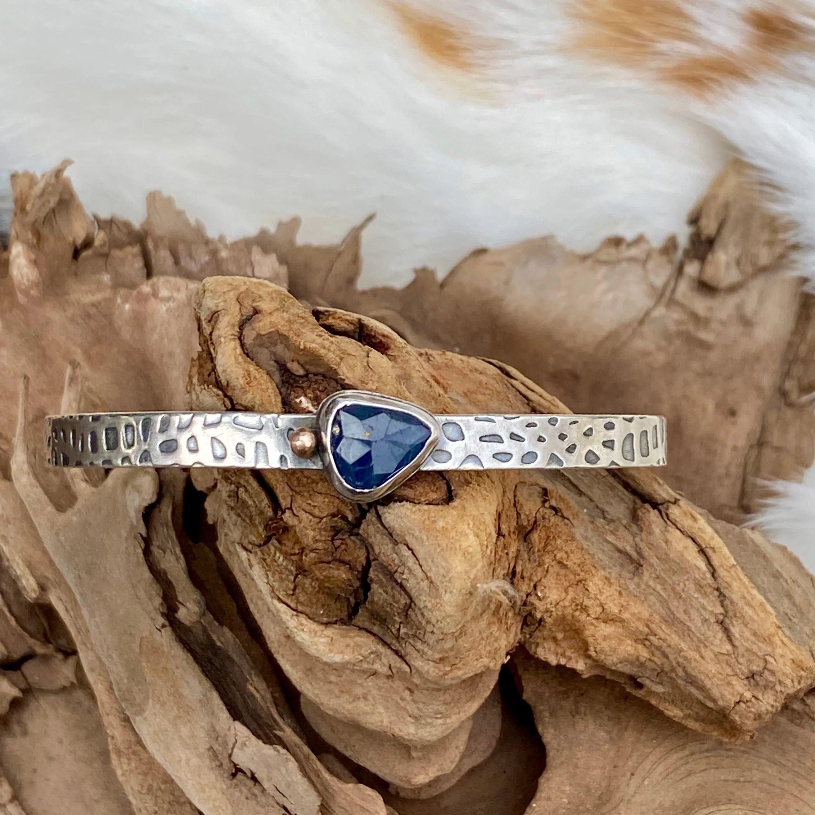 Deep blue Sapphire and gold snakeskin cuffs