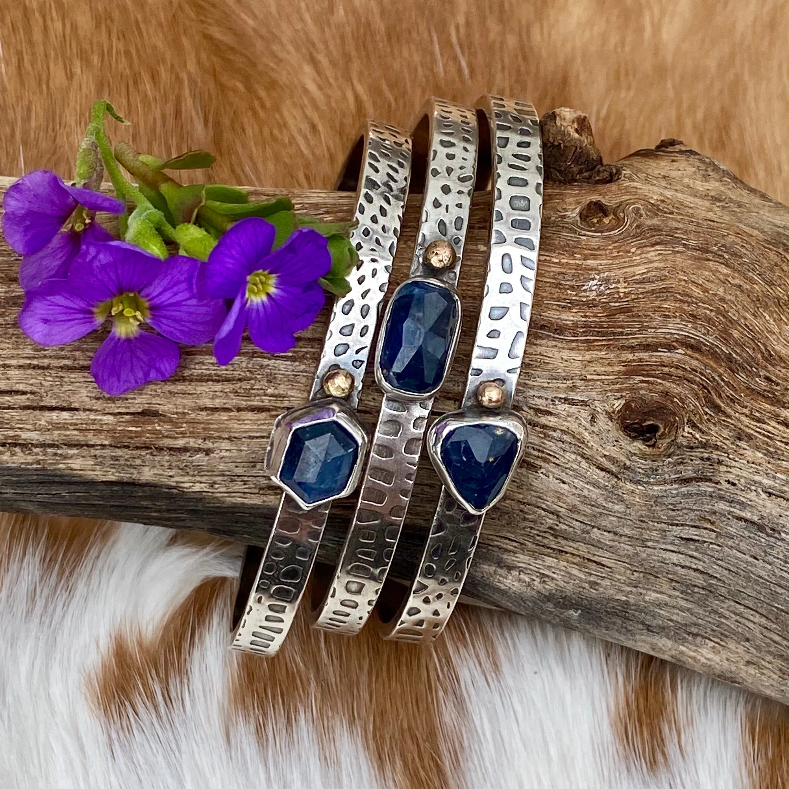Deep blue Sapphire and gold snakeskin cuffs