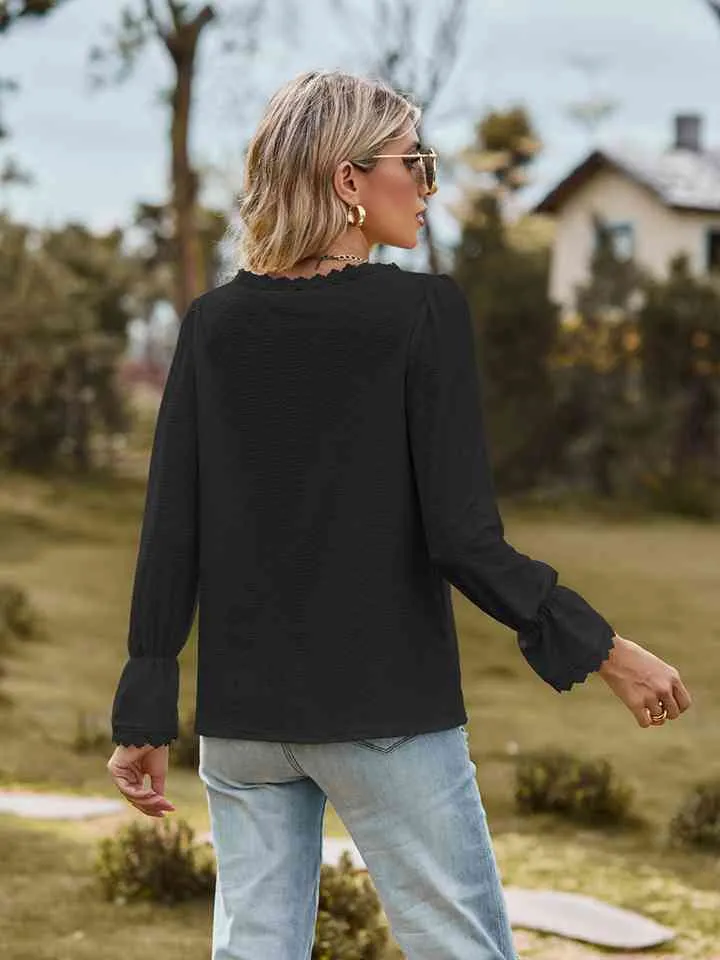 Loretta V-Neck Flounce Sleeve Blouse
