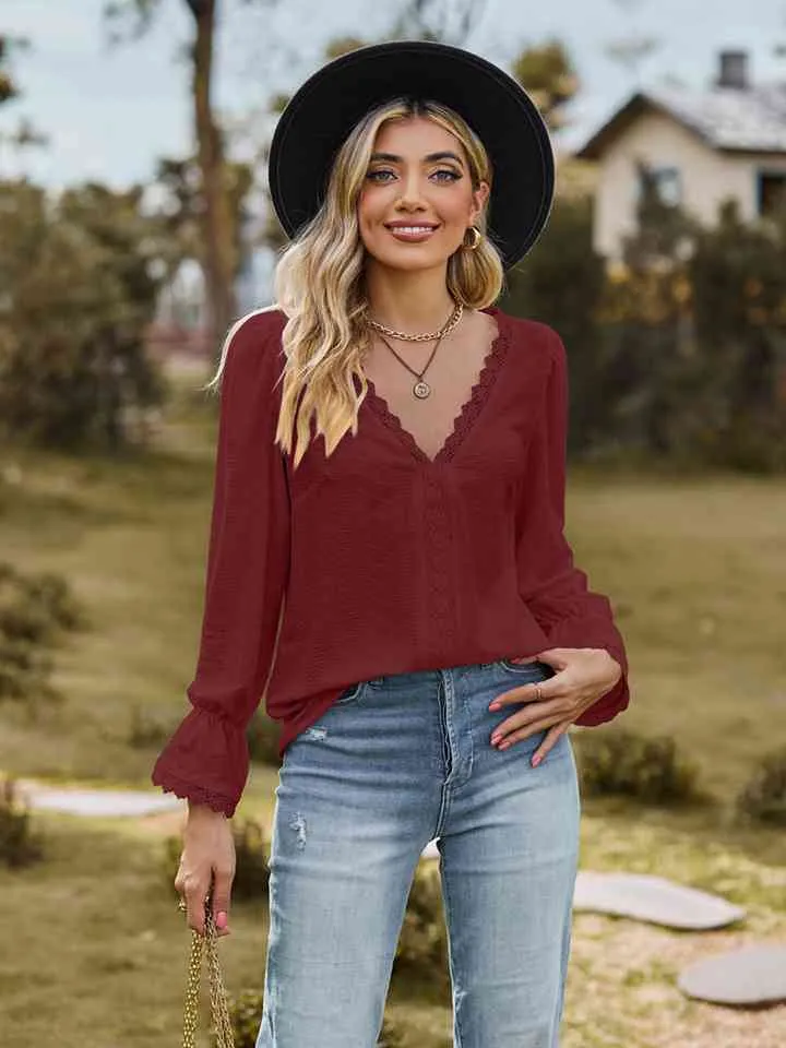 Loretta V-Neck Flounce Sleeve Blouse