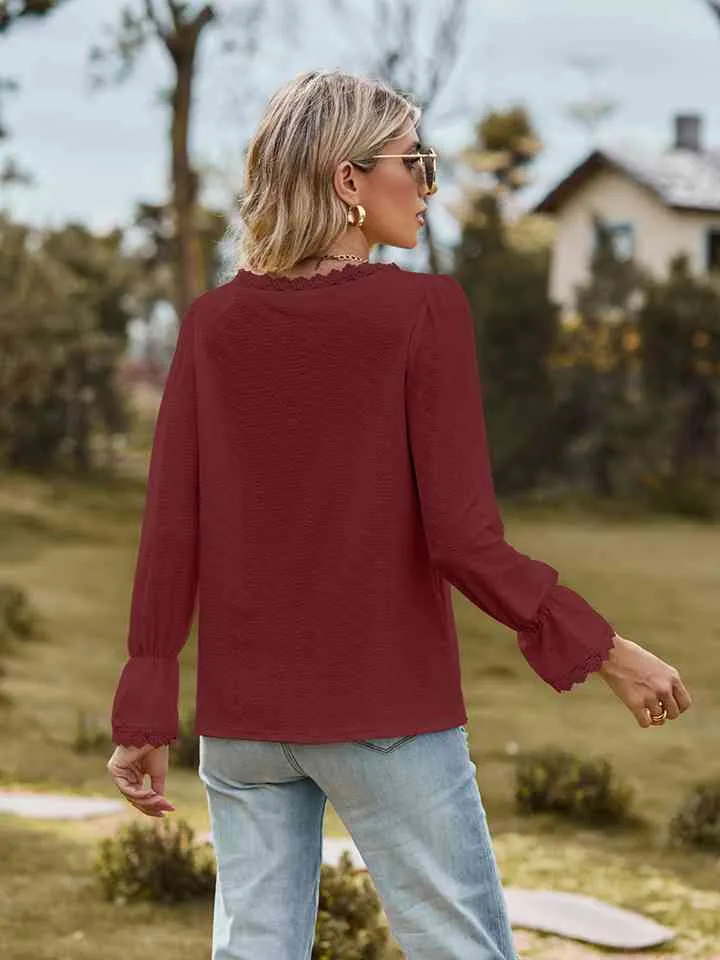Loretta V-Neck Flounce Sleeve Blouse