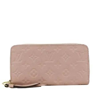 LOUIS VUITTON Clemence Empreinte Leather Wallet Dusty Pink