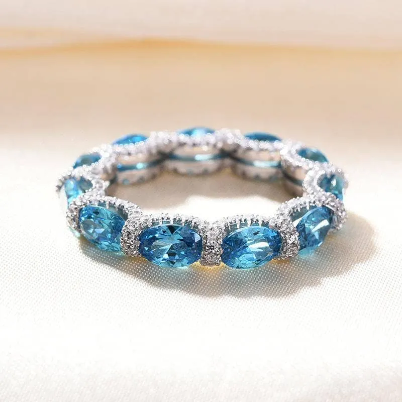 Luxurious Aquamarine Blue Simulated Diamond Wedding Band