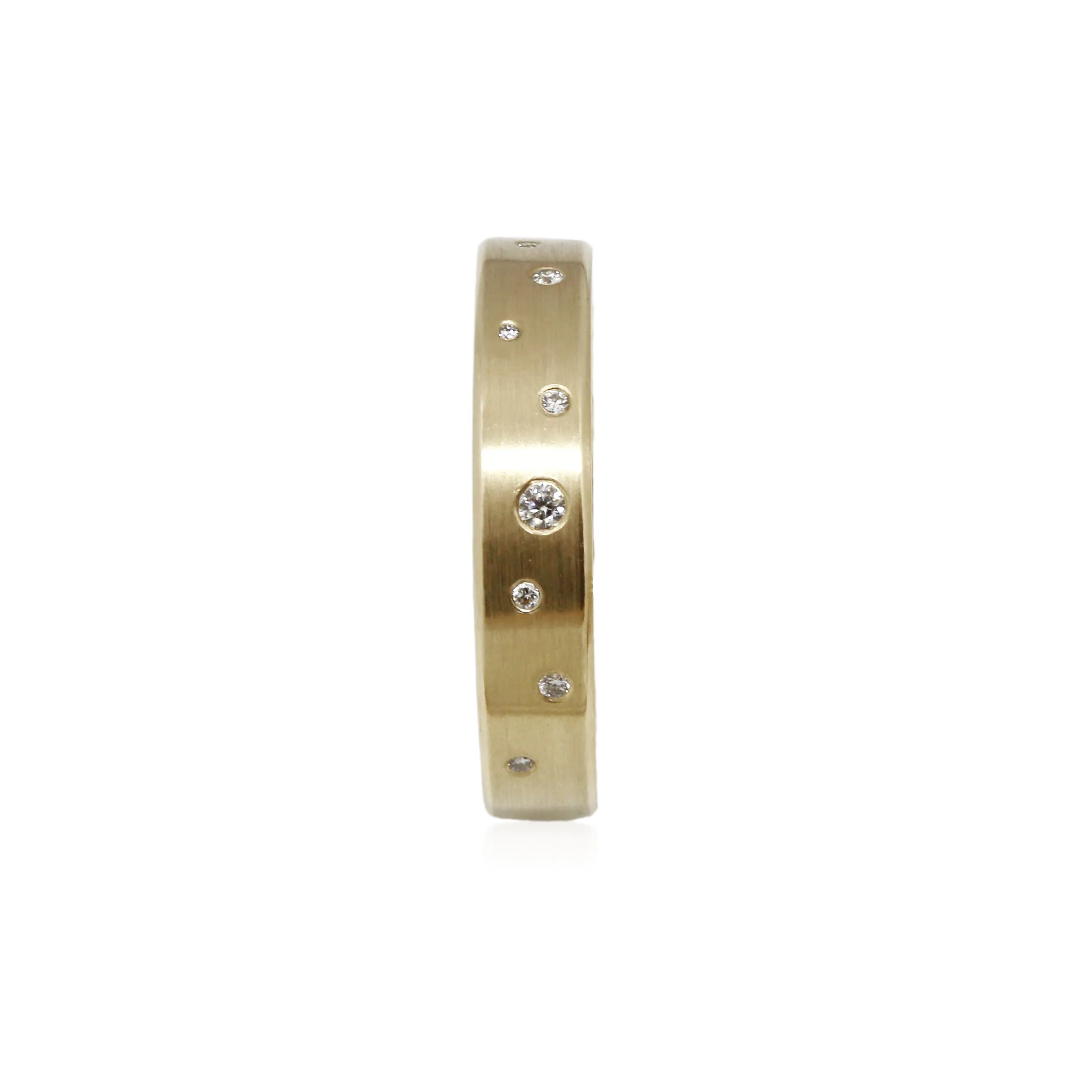 Minimal wedding band in 14k yellow gold with diamonds