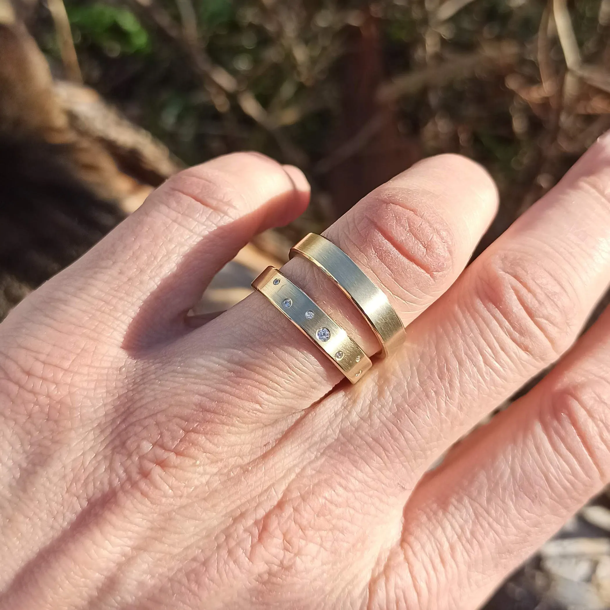 Minimal wedding band in 14k yellow gold with diamonds